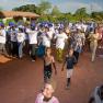 BMC employees march through Nalerigu, Ghana